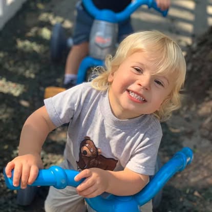 Child on a tricycle
