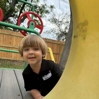 Child on a playground structure