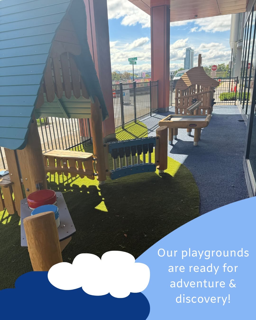 Small wooden play structures on a fenced outdoor patio