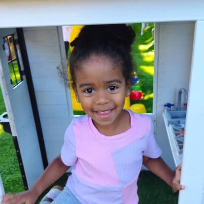 Child in a playhouse