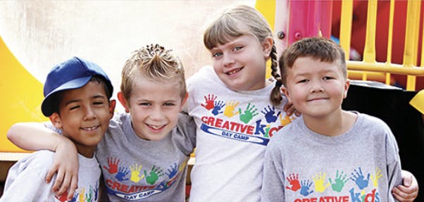 Four children posing together