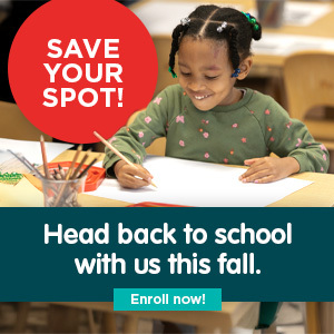 Child drawing at a desk