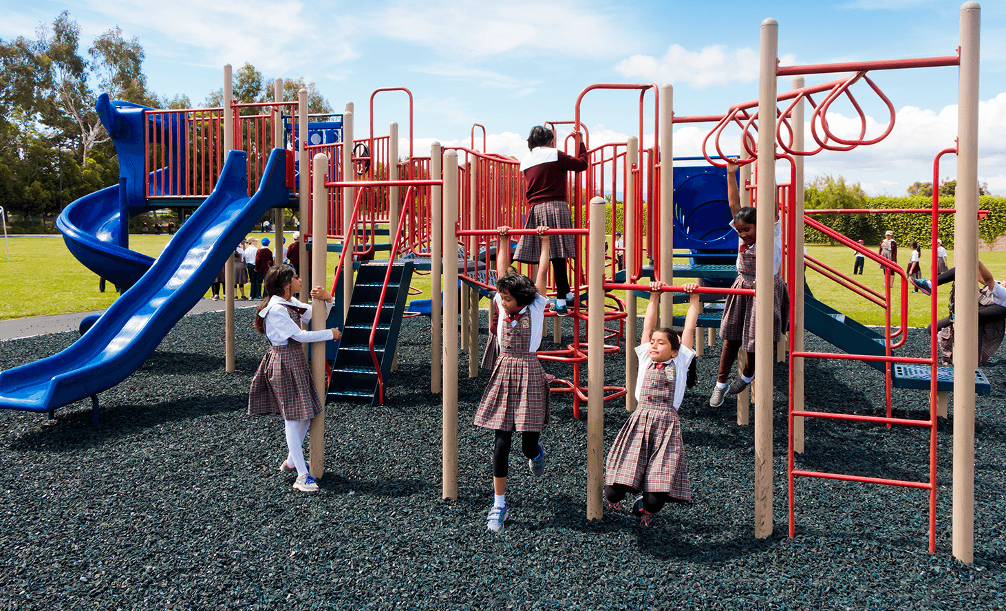 Children playing on a playground structure