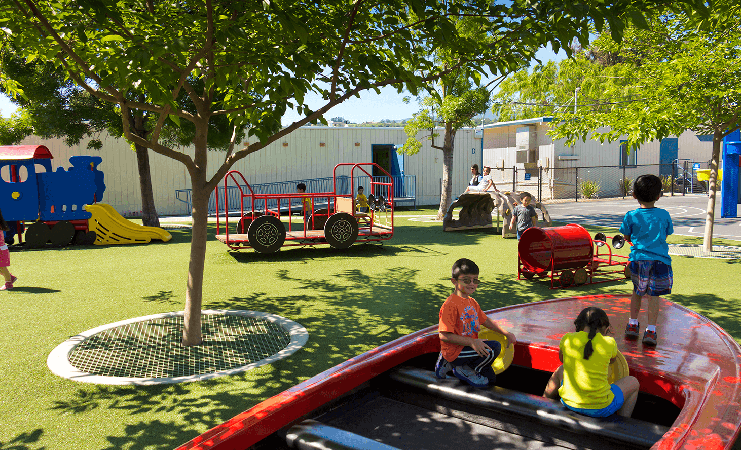 Children playing on playground equipment
