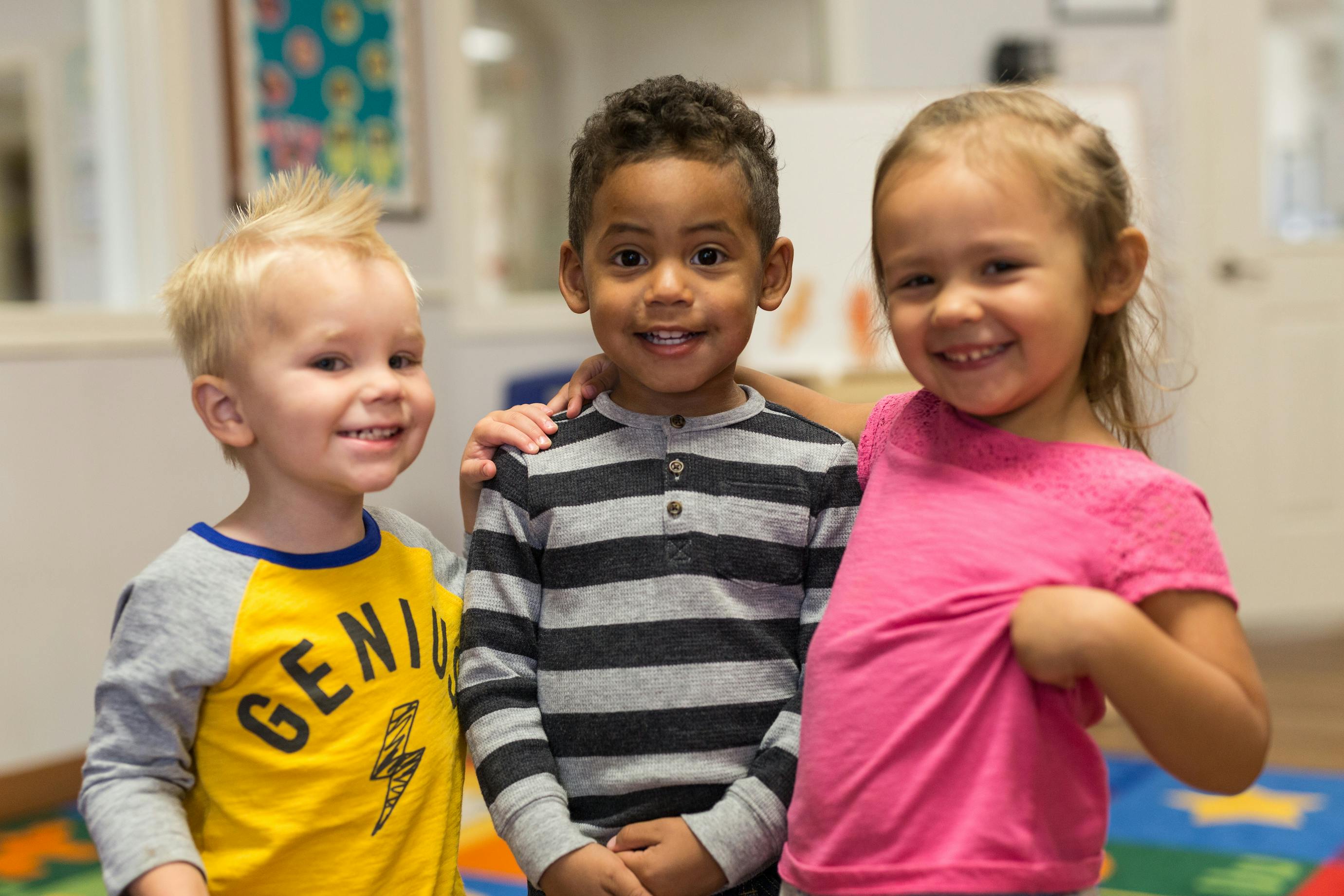 Three children standing together