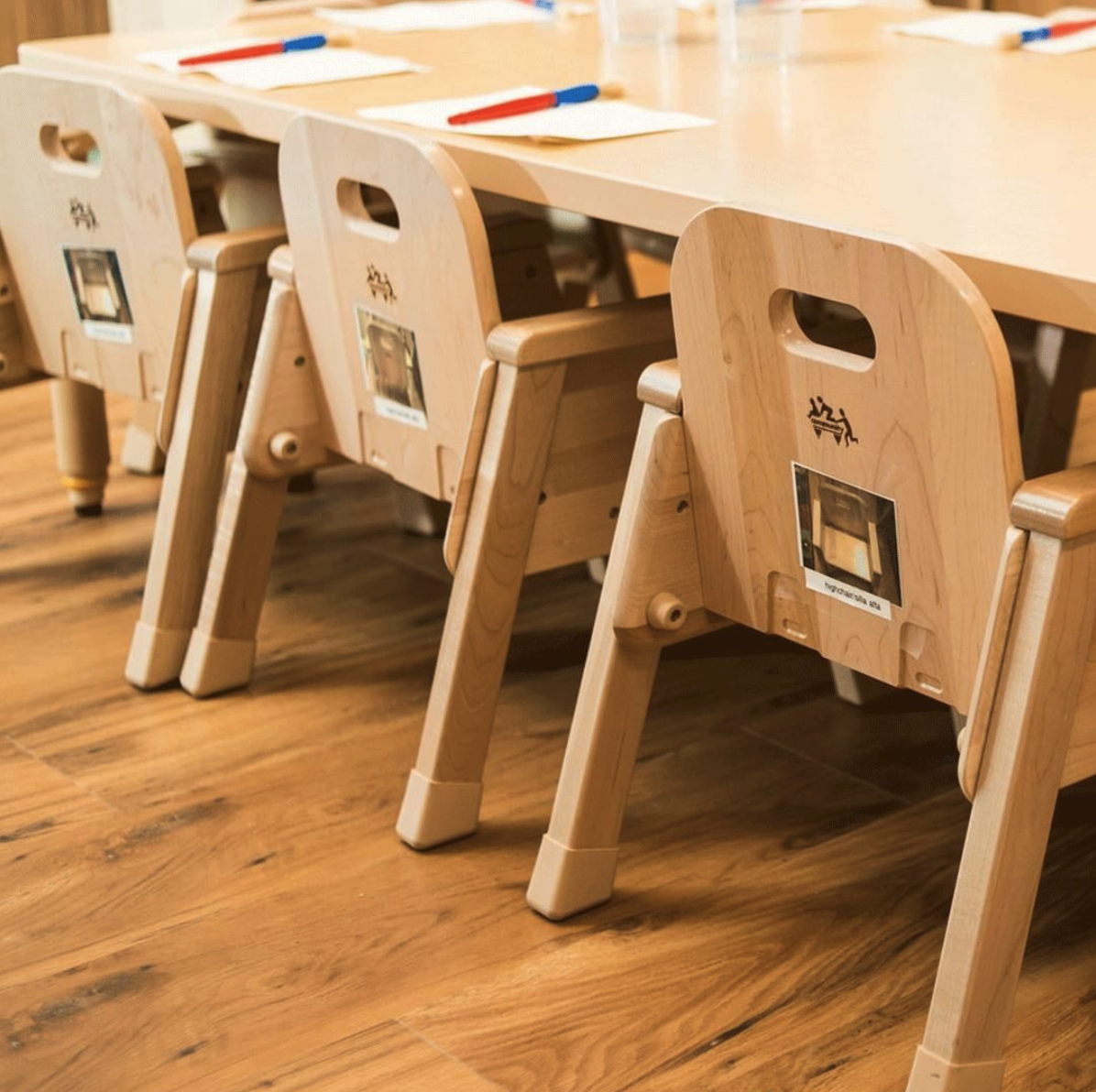 Wooden chairs and table in a classroom