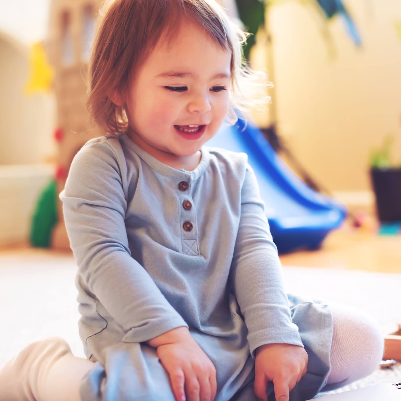 Child sitting on the floor